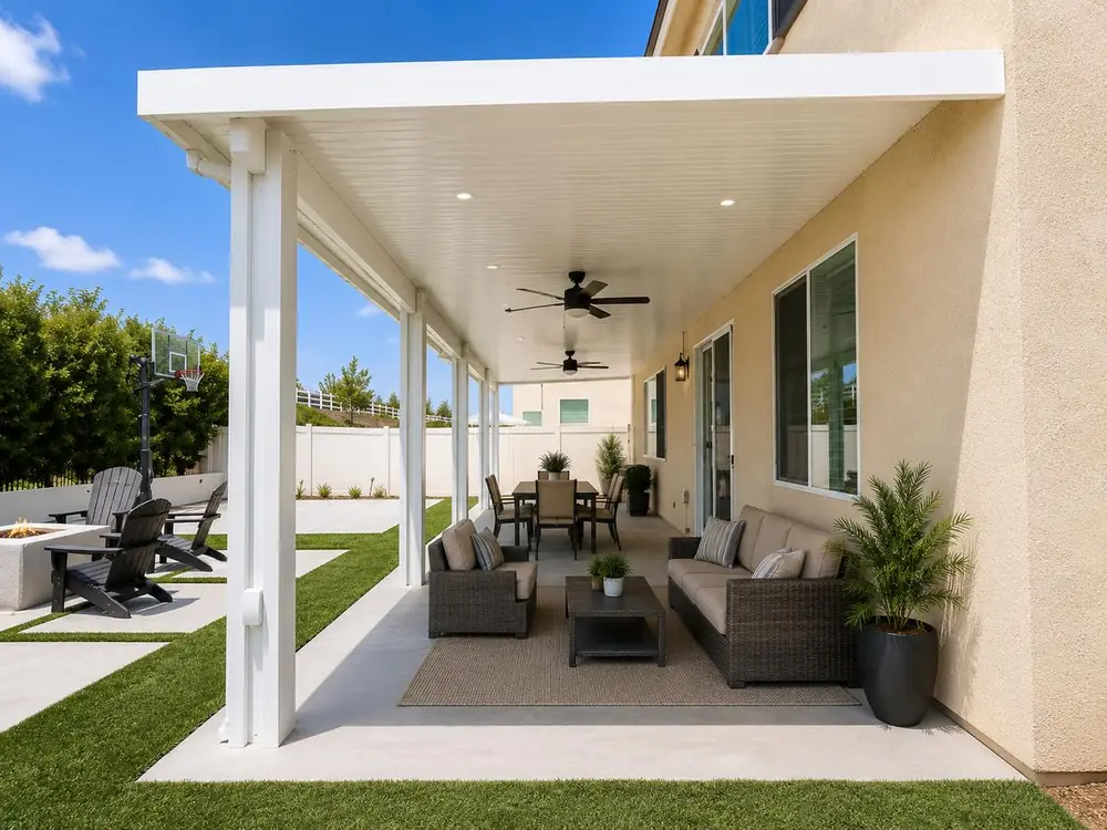 White insulated aluminum patio cover over a long covered lounge and dining run